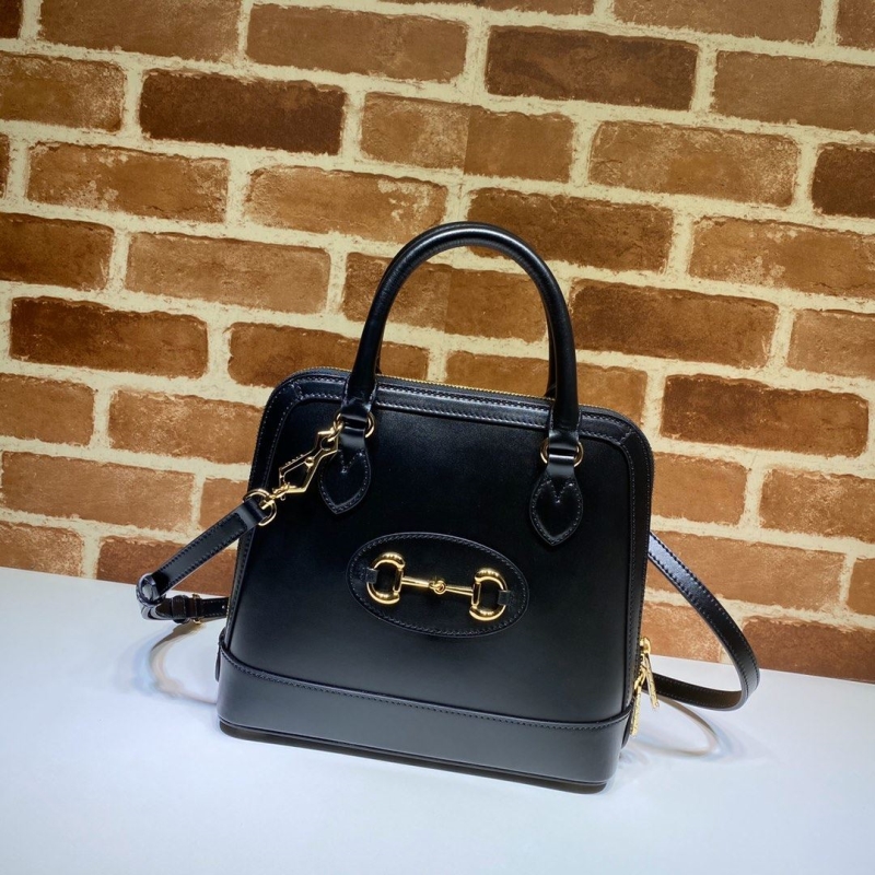 G*u*i top handle bags